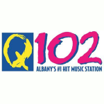 WNUQ 102.1 FM